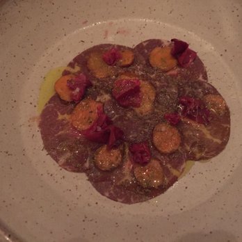 Bateau - Beef carpaccio topped with turmeric and dill pollen - Steakhouses Near Me - Seattle, Washington