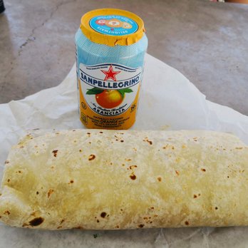Chavinda Taqueria - That's a regularly sized soda can and a $6.50 carnitas burrito. - Mexican Near Me - Madera, California