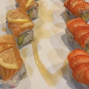 Golden Ginger Bistro - The strawberry one is the Lily roll and the citrus roll is next to it - Asian Fusion Near Me - Clearfield, Utah