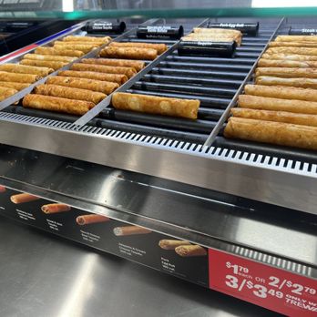 7-Eleven - a conveyor belt with hotdogs on it - Convenience Stores Near Me - Beltsville, Maryland 7-Eleven - a conveyor belt with hotdogs on it - Convenience Stores Near Me - Beltsville, Maryland