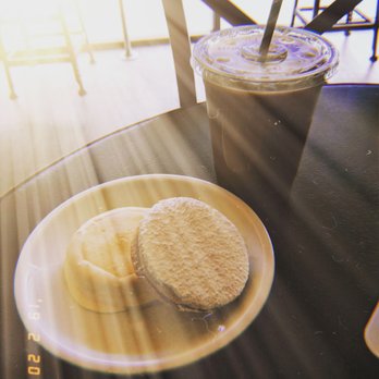 Casa Del Alfajor - White chocolate and powdered sugar Alfajor and an iced latte! - Coffee & Tea Near Me - Concord, California