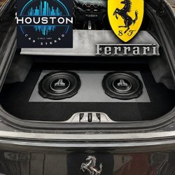 Houston Car Stereo - Custom Ferrari F12 trunk audio system featuring dual JL Audio TW3 10-inch subwoofers professionally installed & tuned by Houston Car Stereo