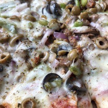 Bazbeaux Pizza - Colossus Pie with green olives added - Pizza Near Me - Indianapolis, Indiana