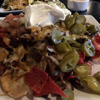 BlueFire Lounge - Texas Nachos lacked cheese - New American Near Me - Irving, Texas