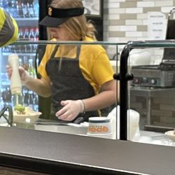 QDOBA Mexican Eats - Hair should be completely pulled back.