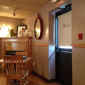 MA Raffa's - a dining room with a fireplace - Italian Near Me - Somerset, Massachusetts MA Raffa's - a dining room with a fireplace - Italian Near Me - Somerset, Massachusetts