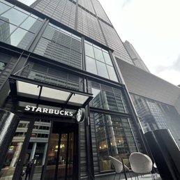 the entrance of a starbucks coffee shop