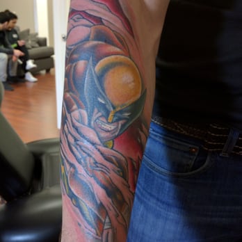 All Saints Tattoo - Wolverine skin rip by James - Tattoo Near Me - Toms River, New Jersey