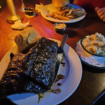 Cadillac Cove - a plate of steak and potatoes on a table - Barbeque Near Me - Satellite Beach, Florida Cadillac Cove - a plate of steak and potatoes on a table - Barbeque Near Me - Satellite Beach, Florida