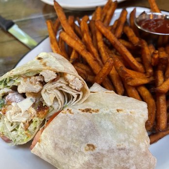 Hudson Hall - a plate of food including a burrito and fries - Beer Bar Near Me - Jersey City, New Jersey Hudson Hall - a plate of food including a burrito and fries - Beer Bar Near Me - Jersey City, New Jersey