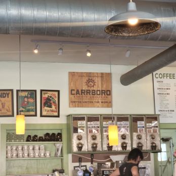 Open Eye Café - a woman at the counter - Coffee & Tea Near Me - Carrboro, North Carolina