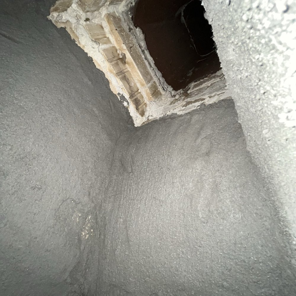 Friendly Fire - Interior parging just done - Chimney Sweeps Near Me Friendly Fire - Interior parging just done - Chimney Sweeps Near Me