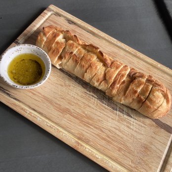 Triple 3 Vineyard - Bread with dipping sauce - Wine Tasting Room Near Me - Washington, Missouri Triple 3 Vineyard - Bread with dipping sauce - Wine Tasting Room Near Me - Washington, Missouri
