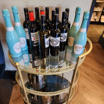 Hutch Cafe - bottles of wine on a gold bar cart - Cafes Near Me - Calgary, Alberta Hutch Cafe - bottles of wine on a gold bar cart - Cafes Near Me - Calgary, Alberta