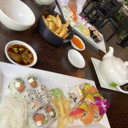 Philly Roll, Crunchy Roll, Rainbow Roll and Salmon Maki Philly Roll, Crunchy Roll, Rainbow Roll and Salmon Maki