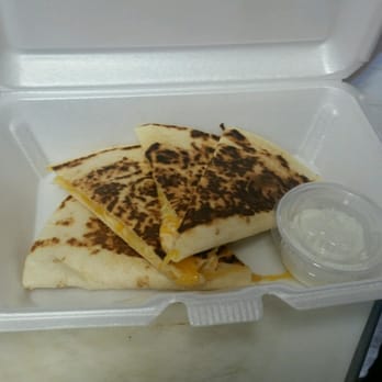 Chris's Kitchen and Catering - a quesadilla in a styrofoam container - Food Trucks Near Me Chris's Kitchen and Catering - a quesadilla in a styrofoam container - Food Trucks Near Me