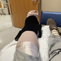 Keeping weight off this leg is a challenge without easy access to the sidewalk, thick ice, and no hand railing.