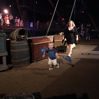 Pirates Dinner Adventure - My son cheering on the blue team - Performing Arts Near Me - Orlando, Florida Pirates Dinner Adventure - My son cheering on the blue team - Performing Arts Near Me - Orlando, Florida