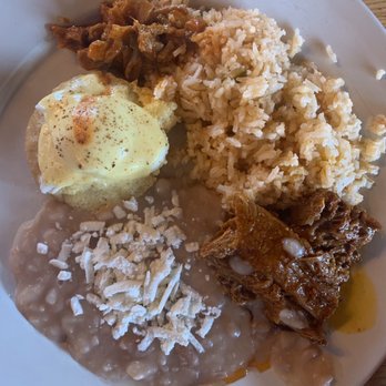 Los Moles - Habanero mole, refried beans with queso fresco, green rice (vegan), eggs Benedict and a little side of pork belly. - Mexican Near Me - El Cerrito, California Los Moles - Habanero mole, refried beans with queso fresco, green rice (vegan), eggs Benedict and a little side of pork belly. - Mexican Near Me - El Cerrito, California