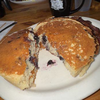 The Outpost - Pancakes with blueberries & walnuts added then a side of bacon and the worlds best coffee. - American Near Me - Savannah, Tennessee The Outpost - Pancakes with blueberries & walnuts added then a side of bacon and the worlds best coffee. - American Near Me - Savannah, Tennessee