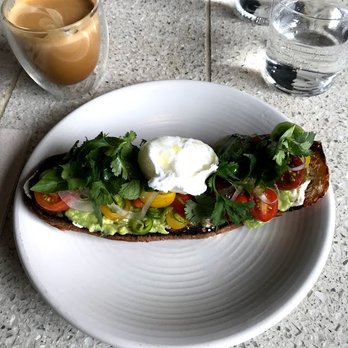 Atla - goat cheese and avocado toast with poached egg - Mexican Near Me - New York, New York