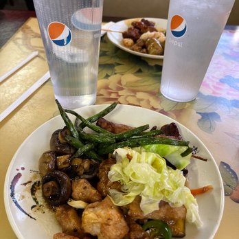 Hunan Chinese Restaurant - a plate of food and a glass of water - Chinese Near Me - Big Spring, Texas Hunan Chinese Restaurant - a plate of food and a glass of water - Chinese Near Me - Big Spring, Texas