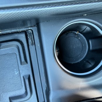 Bethpage Car Wash - Front console and cup holder still dirty - Car Wash Near Me - Bethpage, New York Bethpage Car Wash - Front console and cup holder still dirty - Car Wash Near Me - Bethpage, New York