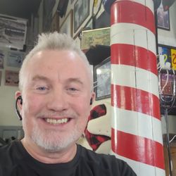 Perry's Barber Shop - Perry in his Shop.