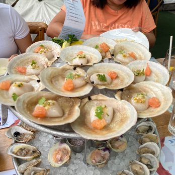 Fishing With Dynamite - raw oysters, scallops, little neck clams on ice and 4 different dipping condiments - Seafood Near Me - Manhattan Beach, California
