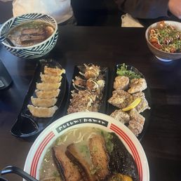 Spicy Karaage Chicken Rice Bowl on the upper right (Appetizers from Left - Right) Gyoza, Takoyaki, and Chicken Karaage Spicy Karaage Chicken Rice Bowl on the upper right (Appetizers from Left - Right) Gyoza, Takoyaki, and Chicken Karaage