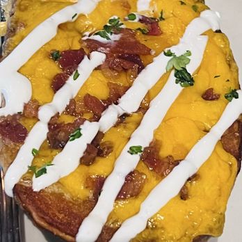 Morrison - Burbank - Close-up of loaded potato skin - Gastropubs Near Me - Burbank, California Morrison - Burbank - Close-up of loaded potato skin - Gastropubs Near Me - Burbank, California