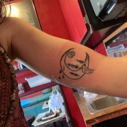Doc Bones' Aim True Tattoo