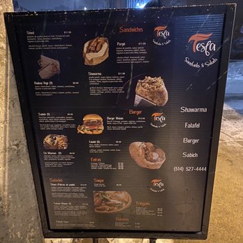 TESFA - a menu on a sidewalk at night - Sandwiches Near Me - Montreal, Quebec TESFA - a menu on a sidewalk at night - Sandwiches Near Me - Montreal, Quebec