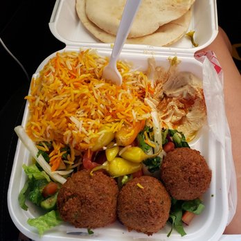 Fatima's Grill - Falafel Platter with most amazing rice comes with 4 falafel but we ate one it was DELICIOUS! - Mediterranean Near Me - Downey, California