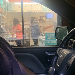 3 ladies inside (after calling over 5 times no answer), why didn't they answer the phone. Orangy shirt preparing my "gritty" smoothie. 3 ladies inside (after calling over 5 times no answer), why didn't they answer the phone. Orangy shirt preparing my "gritty" smoothie.