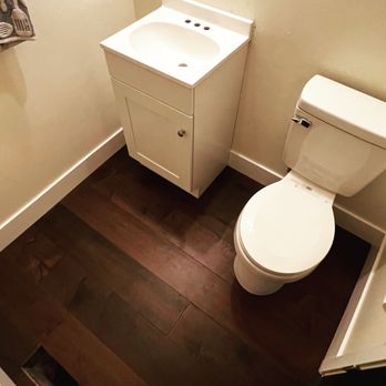 Superior Floors And Remodels - a small bathroom - Tiling Near Me Superior Floors And Remodels - a small bathroom - Tiling Near Me