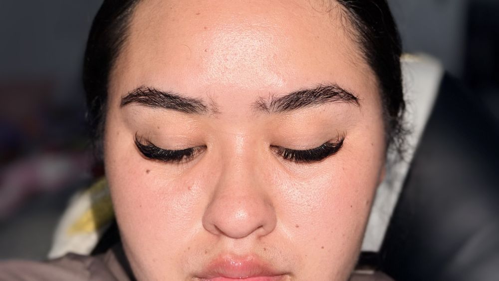 Onyx Nails Wax & Lash Logo