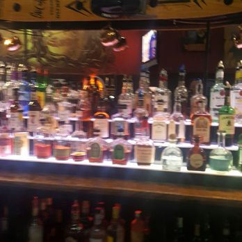 The Pour House - a bar full of liquor bottles - Bars Near Me - Waverly, Iowa The Pour House - a bar full of liquor bottles - Bars Near Me - Waverly, Iowa