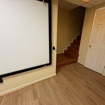 Aladdin Carpet & Floors - Vinyl floor meets the hardwood stairwell. - Flooring Near Me - Gaithersburg, Maryland Aladdin Carpet & Floors - Vinyl floor meets the hardwood stairwell. - Flooring Near Me - Gaithersburg, Maryland
