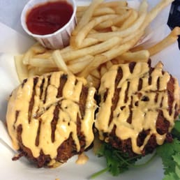 Cap n crunch crab cakes with half order of fries. Cap n crunch crab cakes with half order of fries.