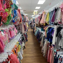 Once Upon A Child - Long aisle of clothes