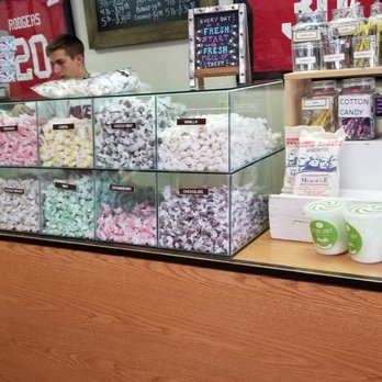 Rushmore Mountain Taffy Shop - a man behind the counter - Candy Stores Near Me - Keystone, South Dakota