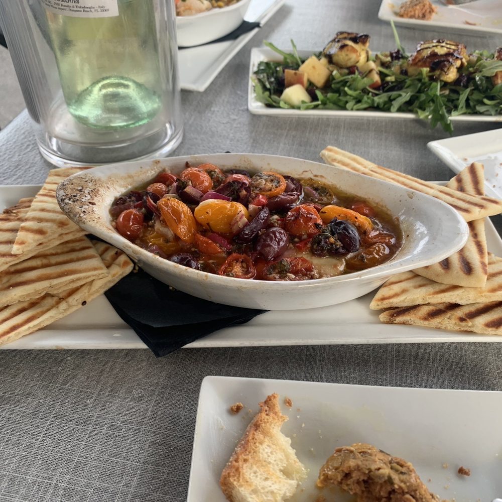 Vino Loco - Baked feta special with olives and tomatoes - Beer, Wine & Spirits Near Me - Englewood, Florida