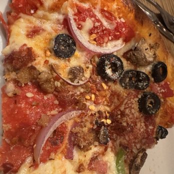 Capone's Coal Fired Pizza - Pizza slice - Pizza Near Me - Fort Myers, Florida Capone's Coal Fired Pizza - Pizza slice - Pizza Near Me - Fort Myers, Florida