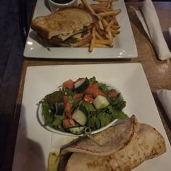 The Fox and Firkin - Top: birria melt with fries Bottom: halloumi fold over with a side garden