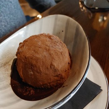 Maialina - Described as a truffle with hazelnut ice cream inside. - Italian Near Me - Indianapolis, Indiana Maialina - Described as a truffle with hazelnut ice cream inside. - Italian Near Me - Indianapolis, Indiana