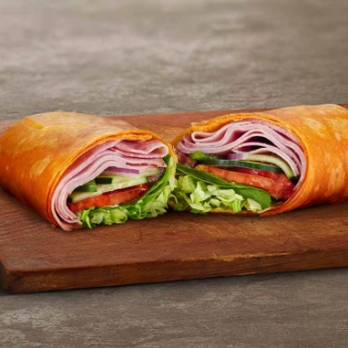 Subway - a cut in half sandwich on a cutting board - Sandwiches Near Me - Kennedale, Texas