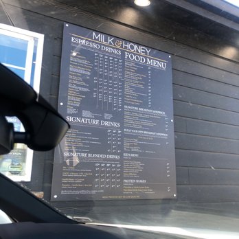 Milk & Honey - a menu on the side of a building - Coffee & Tea Near Me - Hayden, Idaho