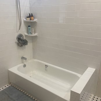 Professional Plumbing Services - Replaced shower with new tub and pony wall. All new wall and floor tiling turned out great! - Plumbing Near Me Professional Plumbing Services - Replaced shower with new tub and pony wall. All new wall and floor tiling turned out great! - Plumbing Near Me