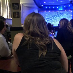This is the person at the table next to me, less than 2 feet away-photo not zoomed in. This is how we were seated by Comix Roadhouse staff.